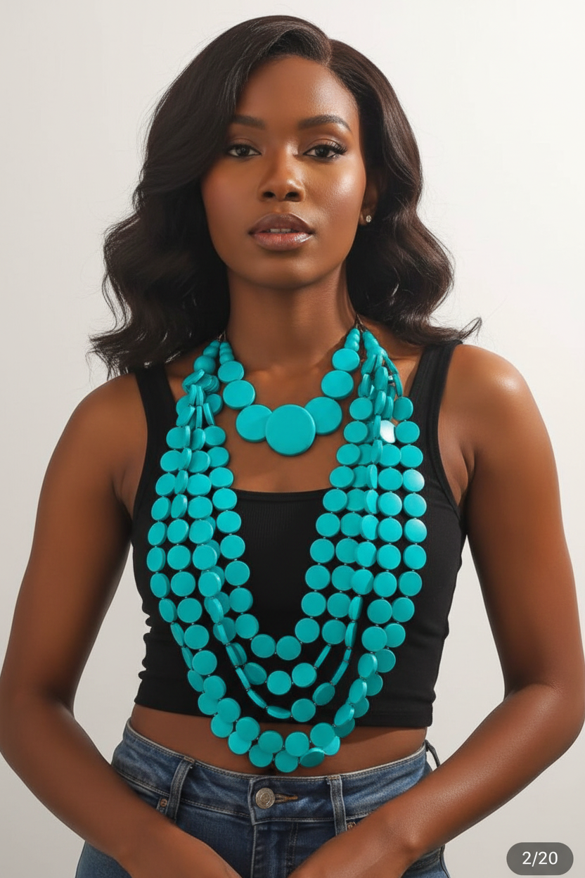 Black Woman Wearing Turquoise Multi-Layered Beaded Necklace