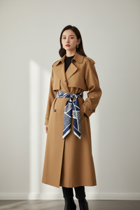 Navy scarf styled as belt over coat